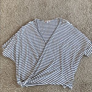 Navy and white loose V necked blouse